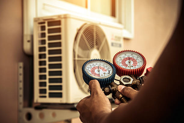 Professional Hvac technician working in Gwynn Oak, MD